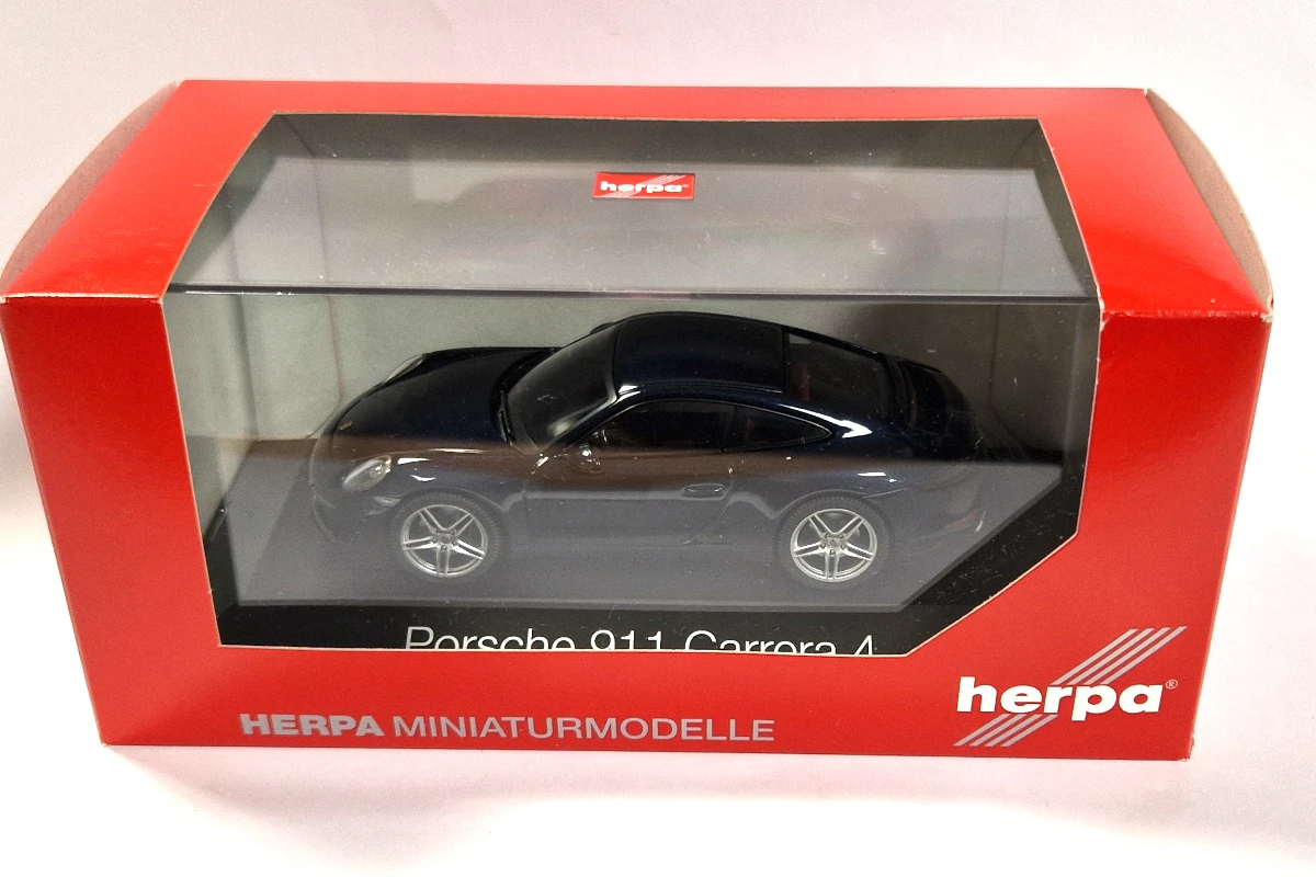 Herpa 071093 Porsche 911 Carrera 4 Dunkelblau Metallic Maßstab 1:43 Modellauto 1 Herpa 071093 Porsche 911 Carrera 4 Dunkelblau Metallic Maßstab 1:43 Modellauto