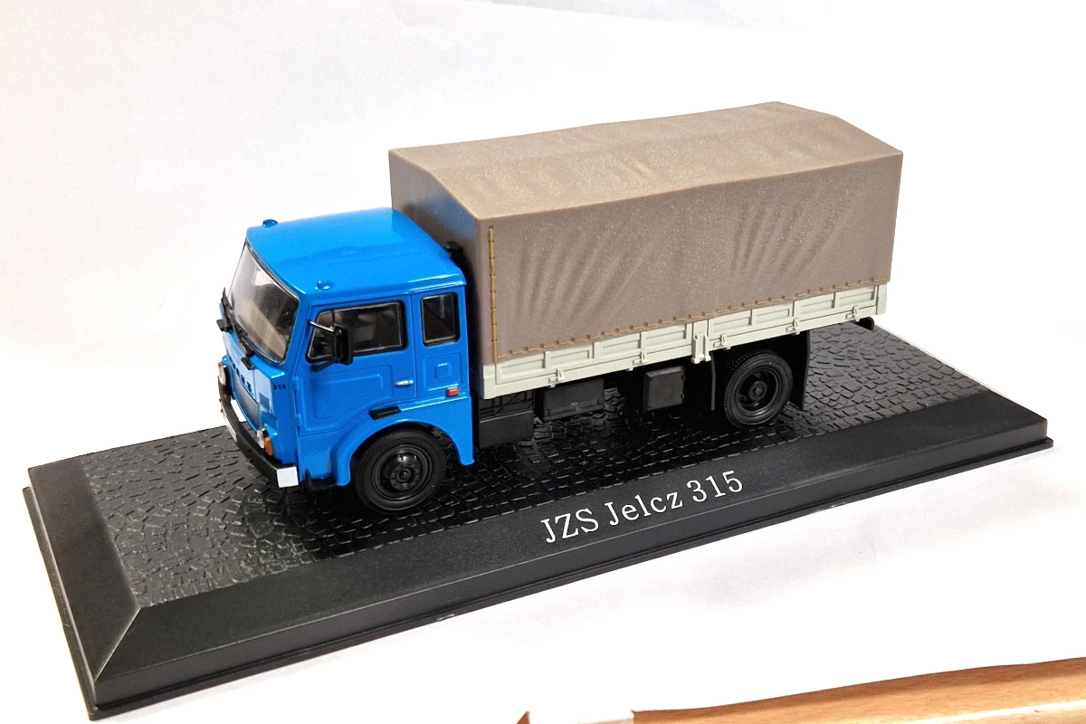 Sonstige Atlas 7167119 JZS Jelcz 315 LKW Pritsche/Plane Blau/grau Maßstab 1:43 Modell (NOS) 1 Sonstige Atlas 7167119 JZS Jelcz 315 LKW Pritsche/Plane Blau/grau Maßstab 1:43 Modell (NOS)