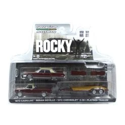 Greenlight 31130-A Cadillac Sedan DeVille 1973 + Chevy C-10 1972 + Trailer "Rocky" Rot - Hollywood H