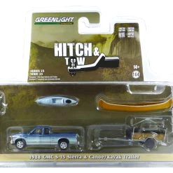 Greenlight 32250-C GMC S-15 Sierra Blau Metallic 1988 + Kayak Trailer - Hitch & Tow 25 Maßstab 1:64